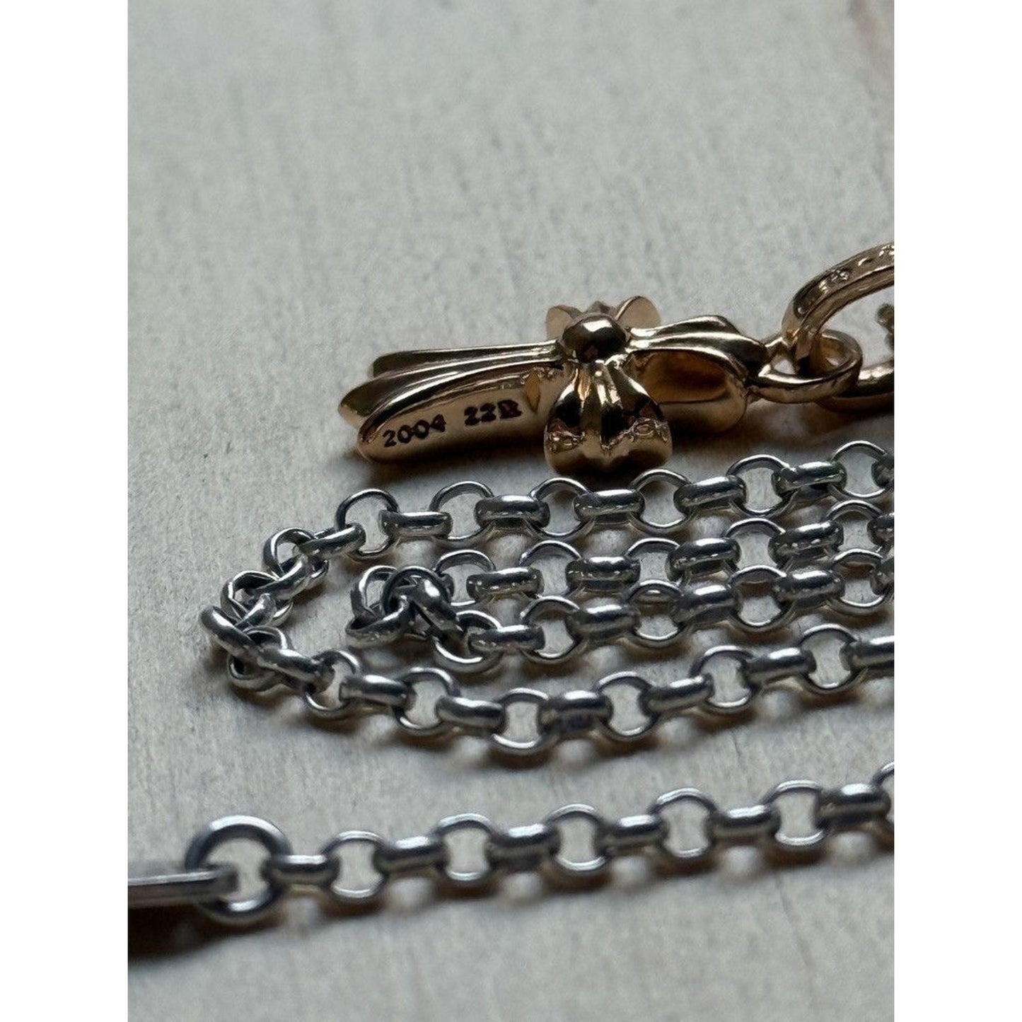 CHROME HEARTS 22K GOLD PAVE RUBY BABY PHAT CROSS PENDANT