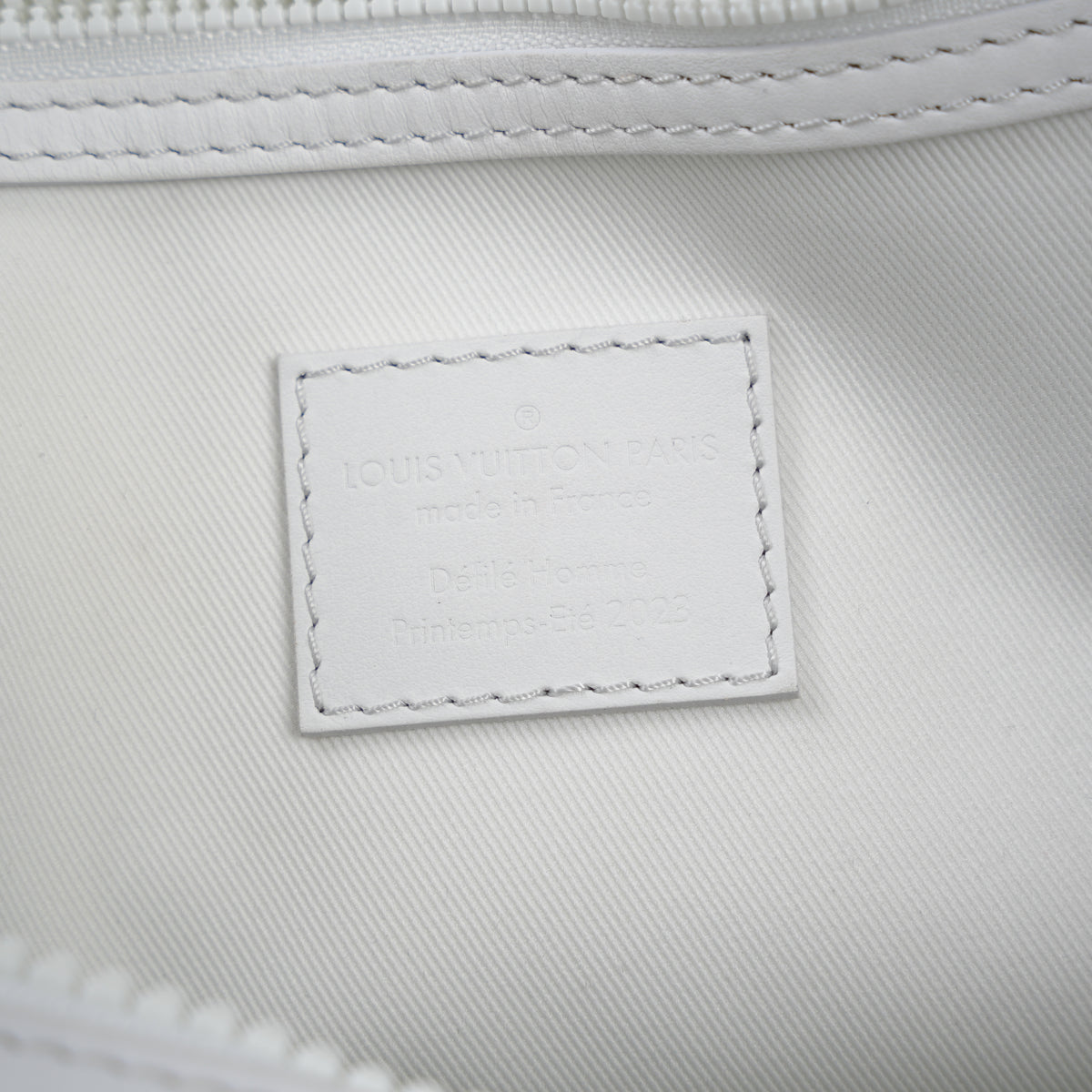 LOUIS VUITTON OPTIC WHITE EMBOSSED MONOGRAM KEEPALL 50 DUFFEL BAG
