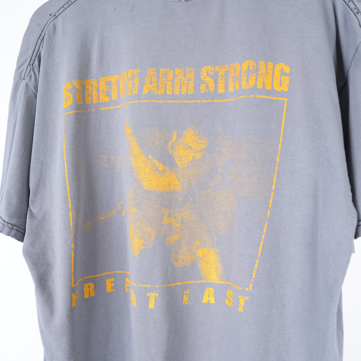 VINTAGE STRETCH ARM STRONG FADED TEE