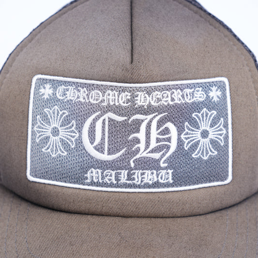 CHROME HEARTS SUN FADED MALIBU TRUCKER HAT
