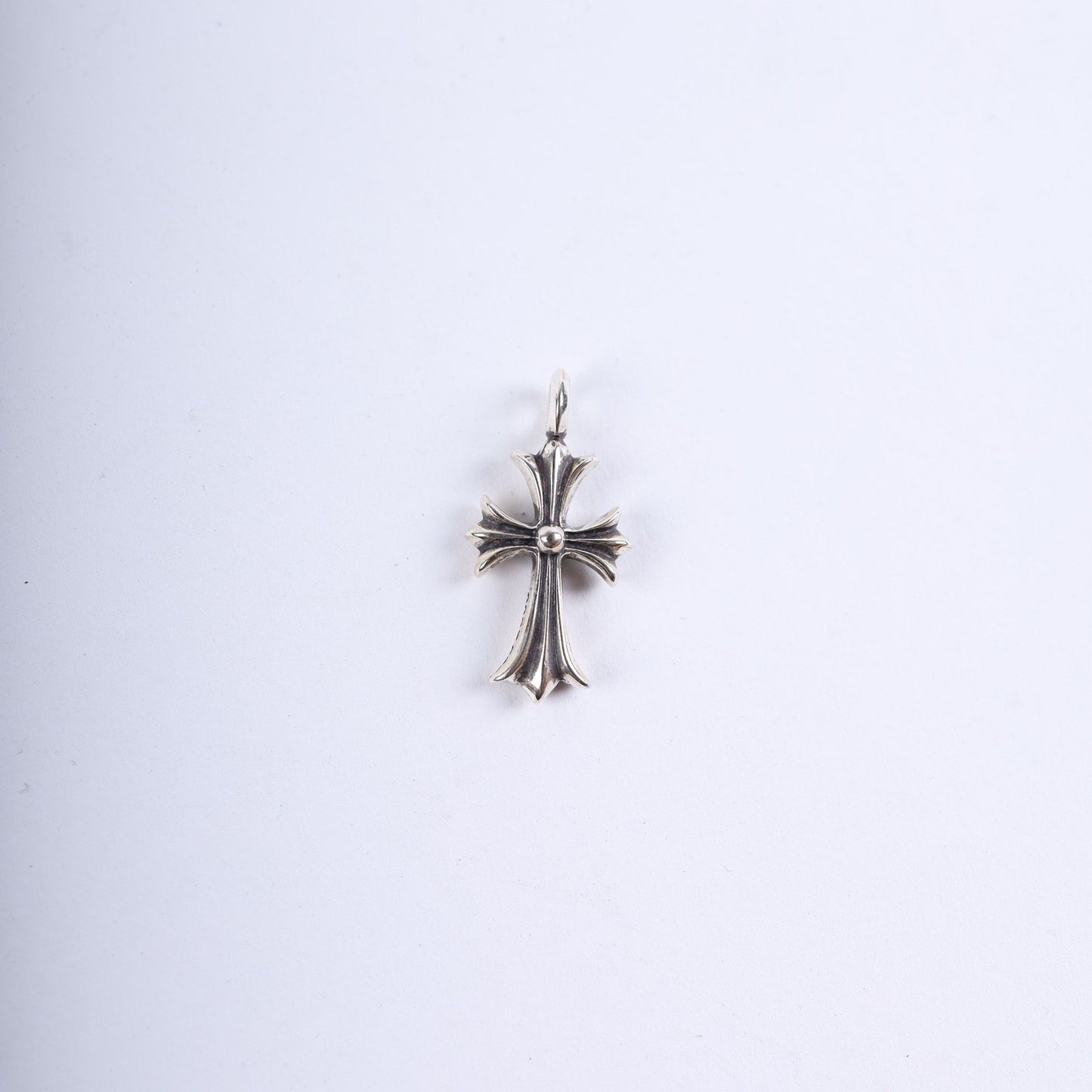 CHROME HEARTS EMERALD TINY CROSS CHARM SILVER