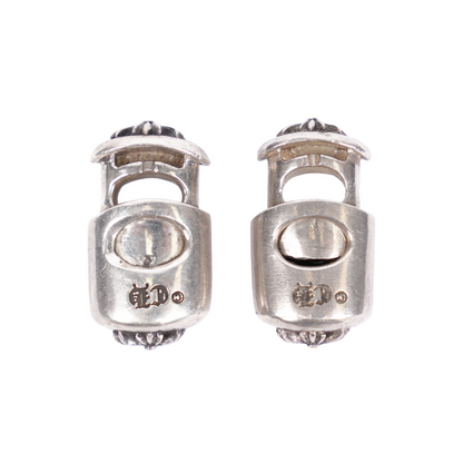 CHROME HEARTS PAIR OF STERLING SILVER .925 LACE LOCK LACE STOPPERS
