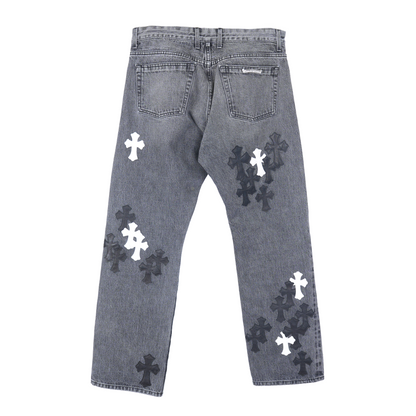 CHROME HEARTS BLACK AND WHITE PATCH FLEUR KNEE DENIM
