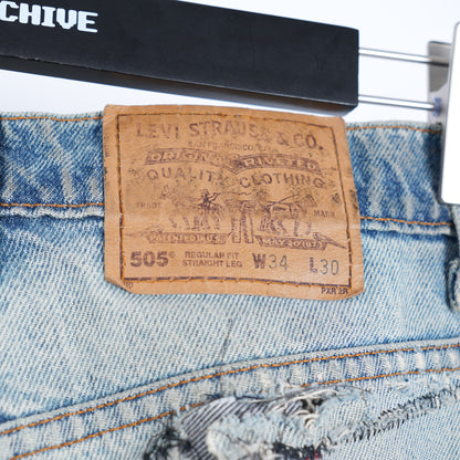 THRASHED ORANGE TAB LEVI'S