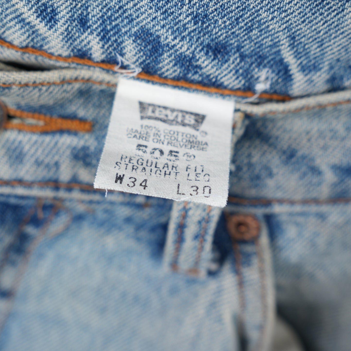 THRASHED ORANGE TAB LEVI'S