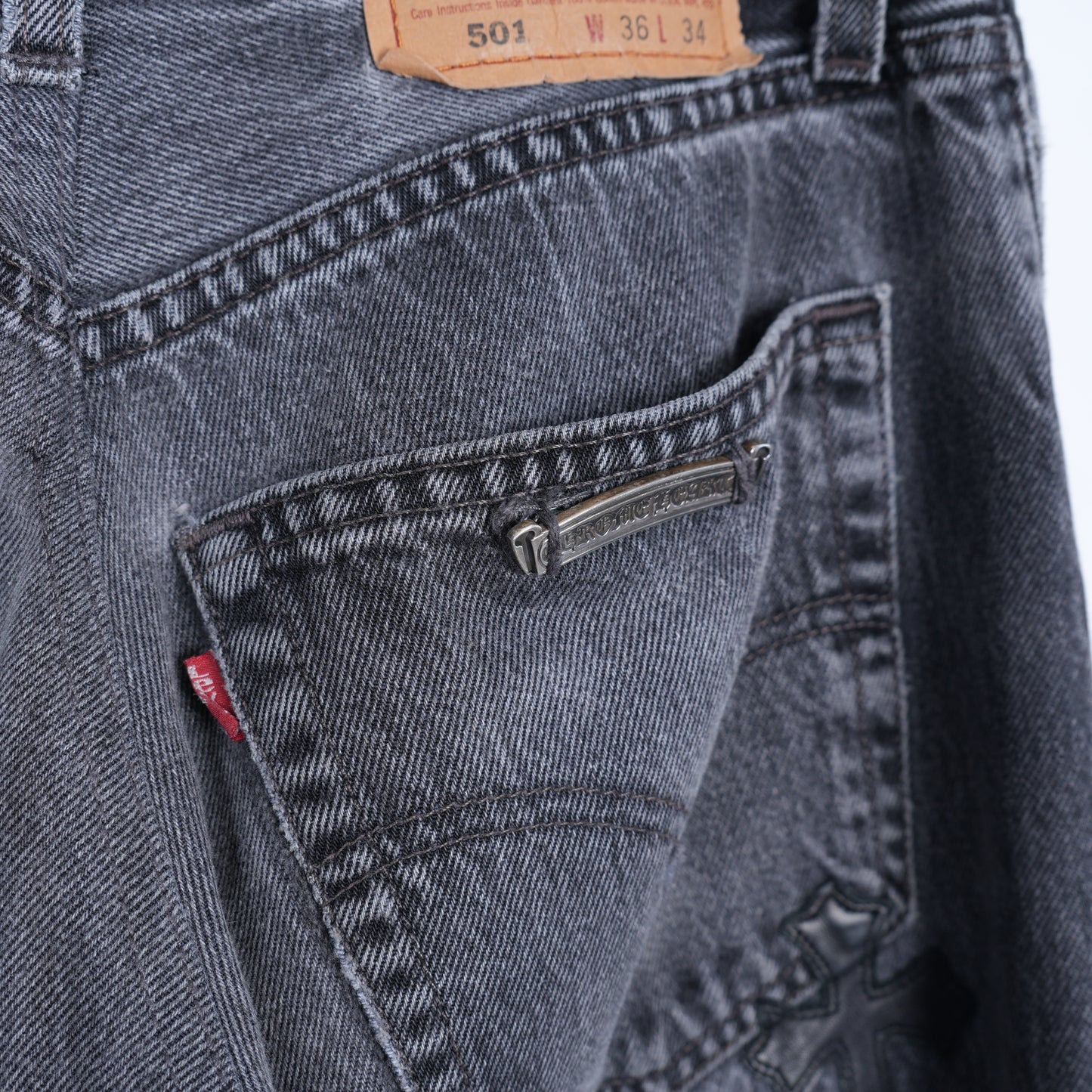 CHROME HEARTS BLACK LEVI CROSS PATCH JEANS