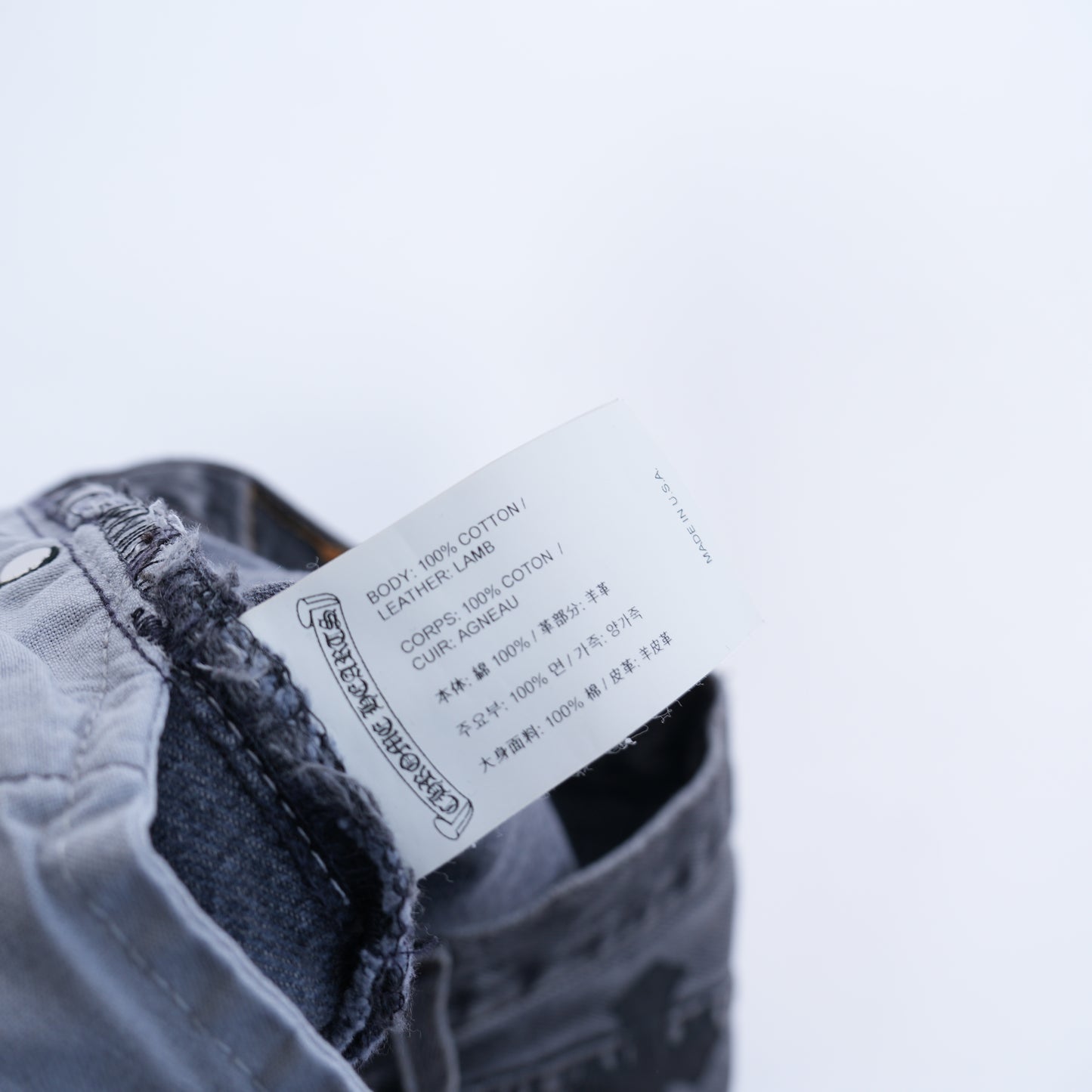 CHROME HEARTS BLACK LEVI CROSS PATCH JEANS