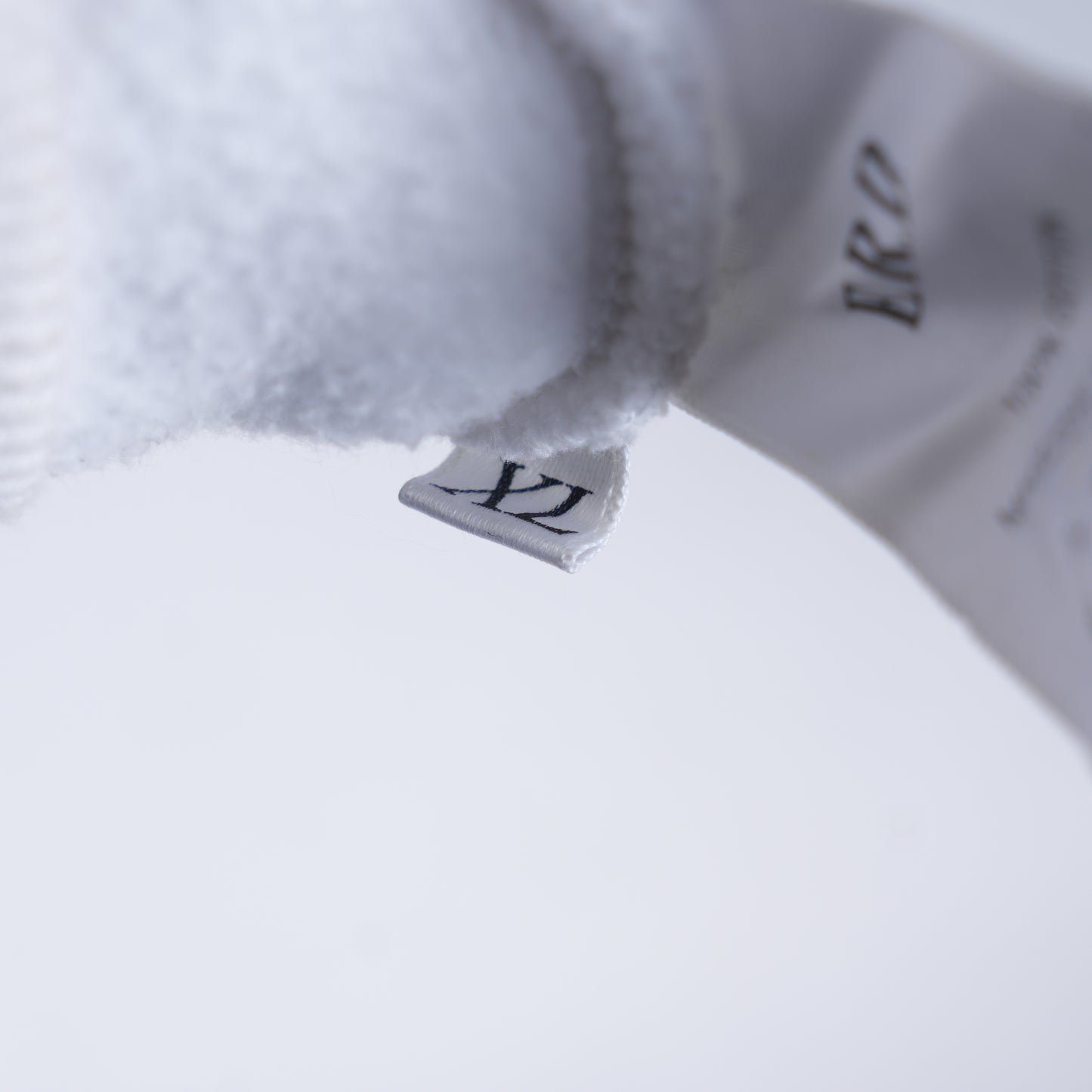 ERD X INDICATES PRIOR DAMAGE WHITE HOODIE