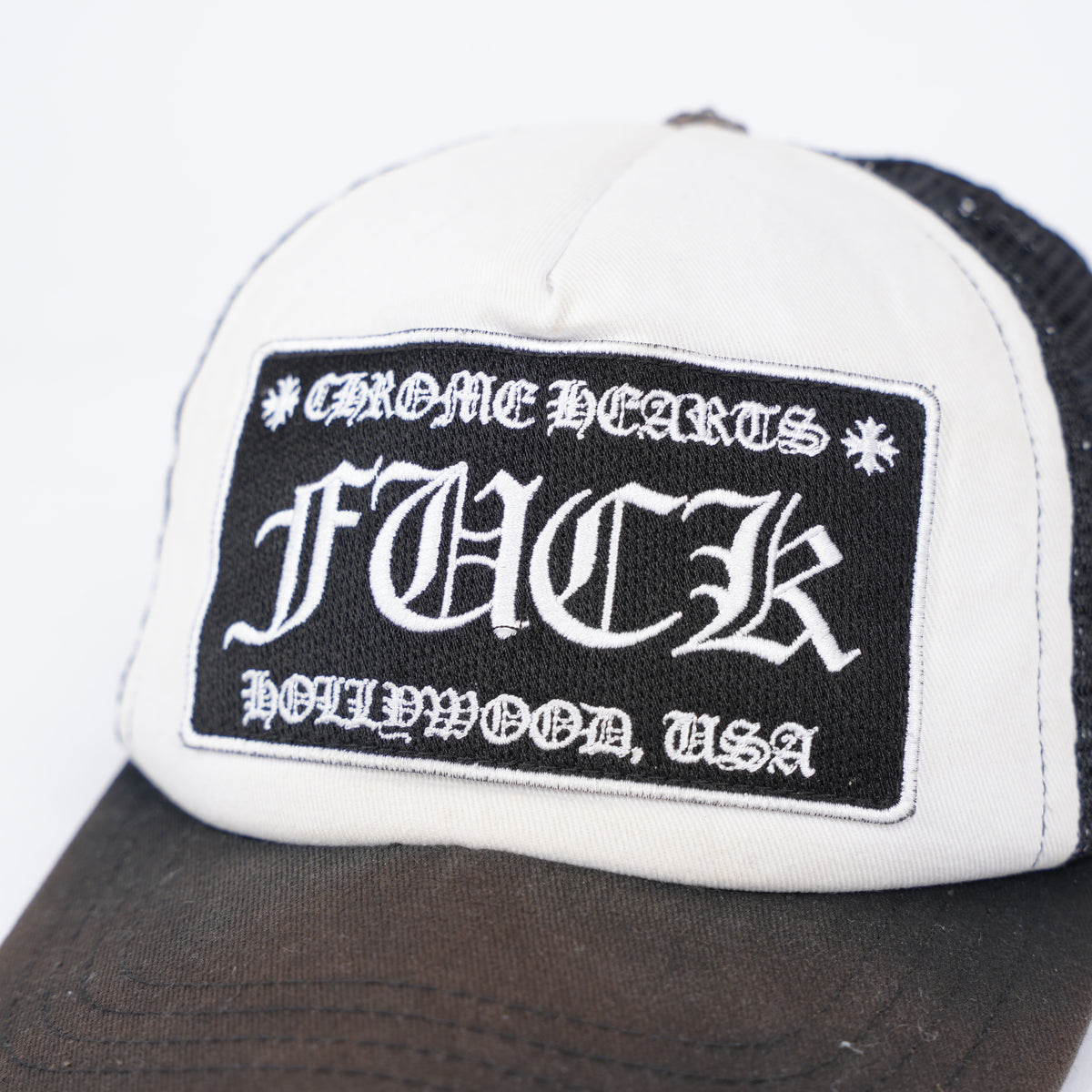 CHROME HEARTS SUNFADED 'FUCK' HOLLYWOOD TRUCKER HAT