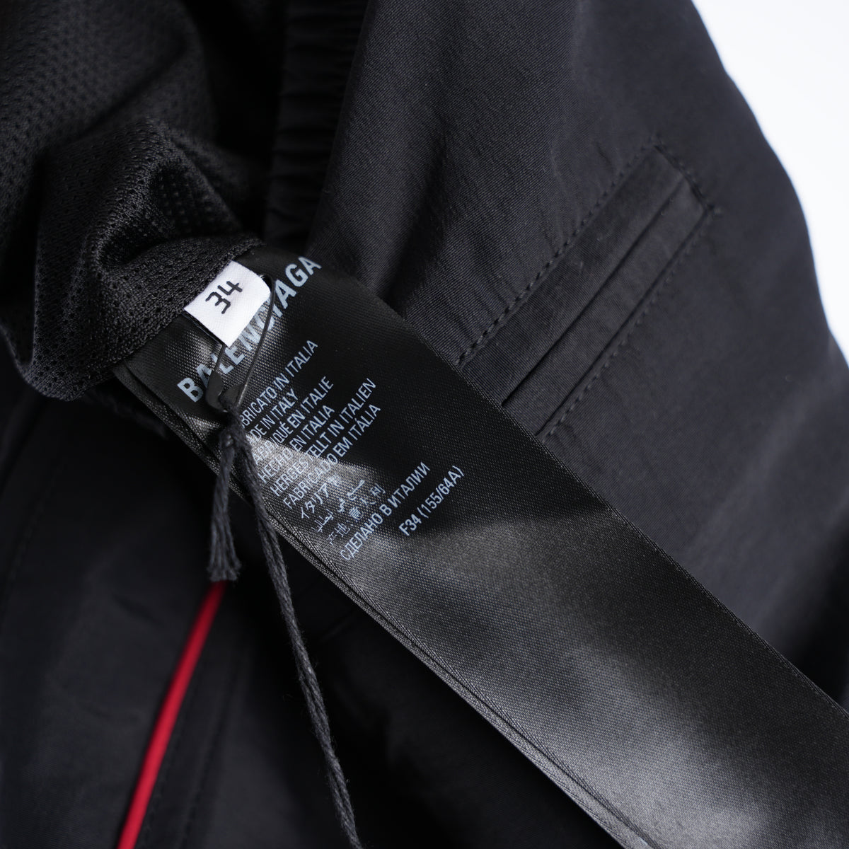 BALENCIAGA RED LINED NYLON CARGO TRACK PANTS