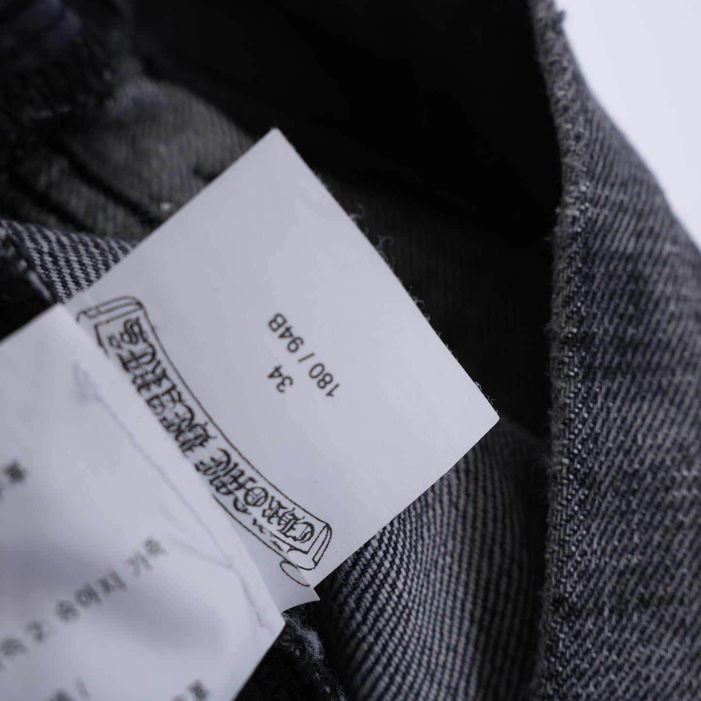 CHROME HEARTS RED AND BLACK CROSS PATCH DRAKE DENIM