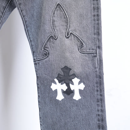 CHROME HEARTS BLACK AND WHITE PATCH FLEUR KNEE DENIM