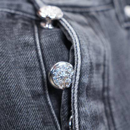 CHROME HEARTS BLACK AND WHITE PATCH FLEUR KNEE DENIM