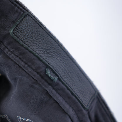 CHROME HEARTS BLACK AND WHITE PATCH FLEUR KNEE DENIM