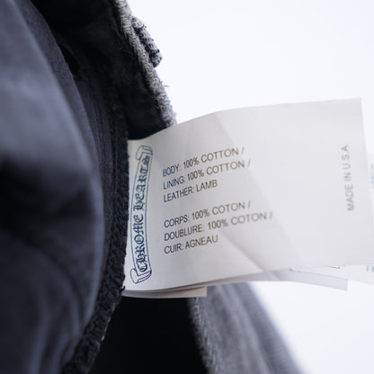 CHROME HEARTS BLACK AND WHITE PATCH FLEUR KNEE DENIM