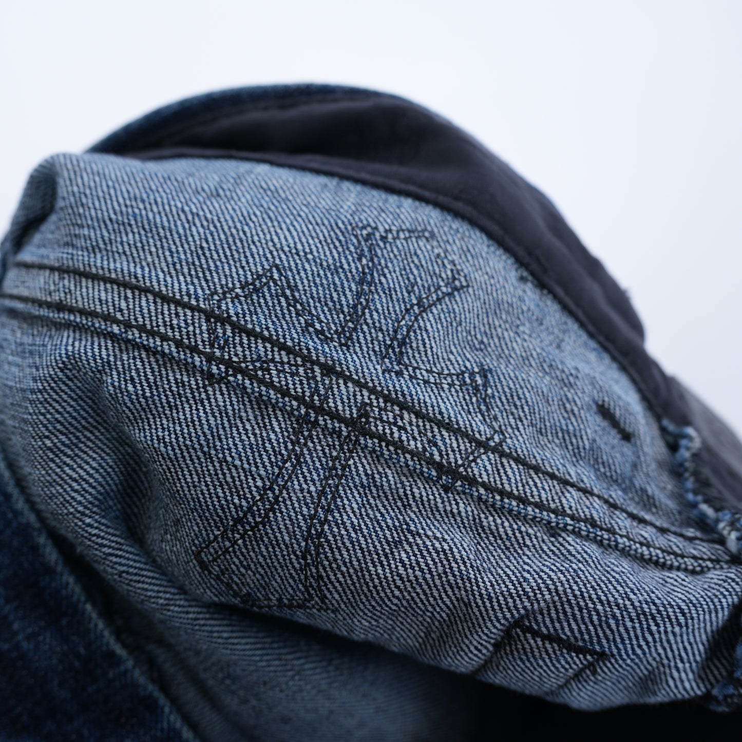 CHROME HEARTS BROWN AND WHITE PATCH FLEUR KNEE DENIM