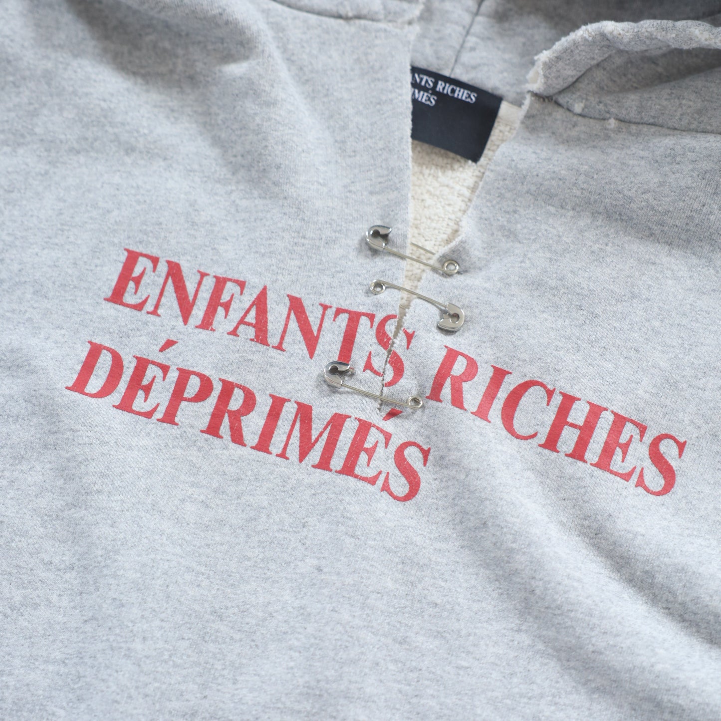 ERD SAFETY PIN CUT OUT HOODIE HEATHER GREY